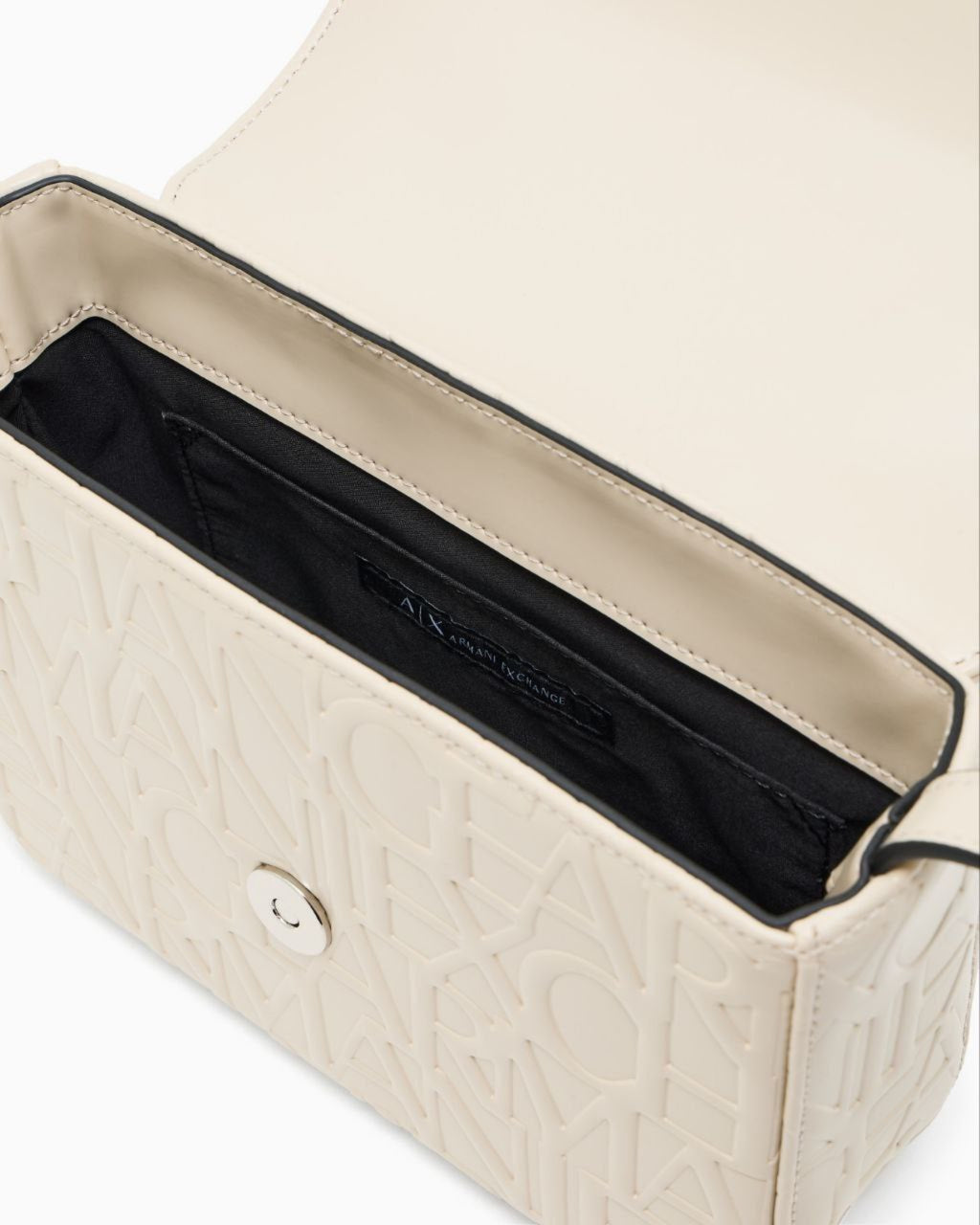 Close-up of a crossbody of Armani with a black interior on a white background