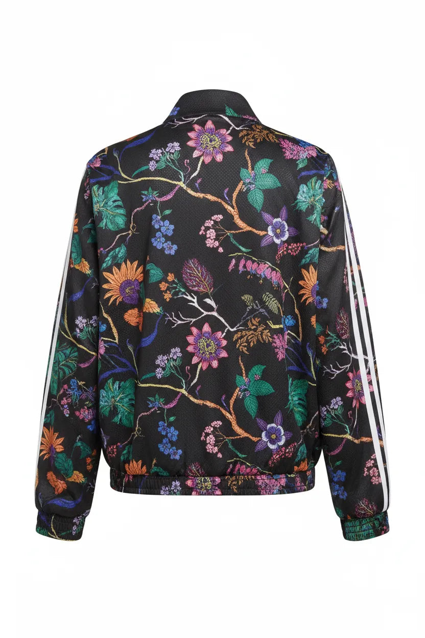 Adidas Originals black floral print track jacket ghost mannequin back view white background colorful botanical print white three stripes down sleeves