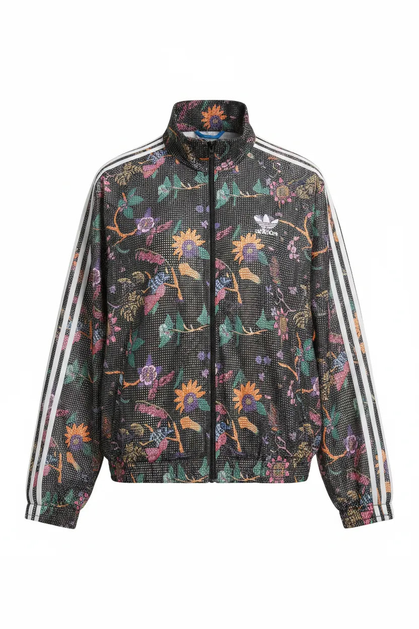 Adidas Originals black floral print track jacket ghost mannequin front view white background colorful botanical print white three stripes trefoil logo