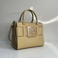 Beige handbag with a brand logo on a light gray background