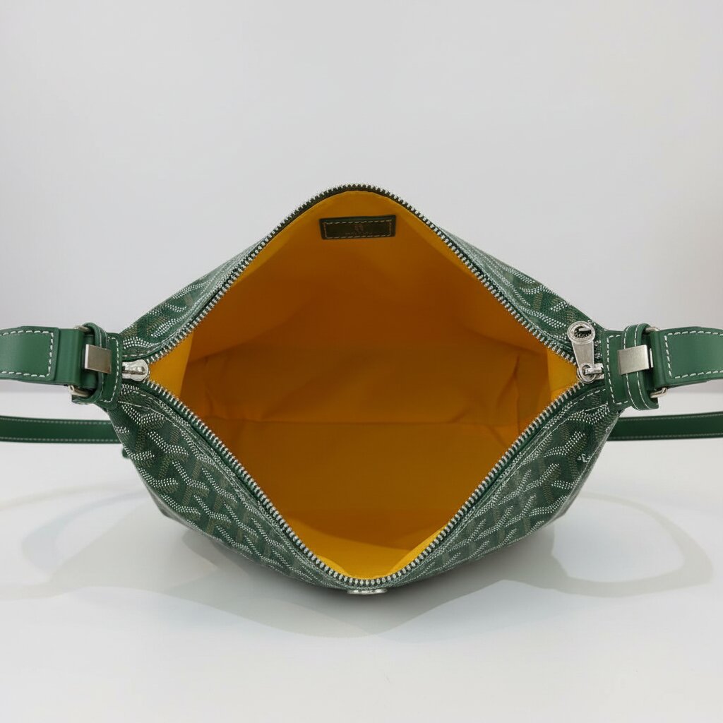 Goyard Hobo Bag in Forest Green - Open Interior View Showing Mustard Yellow Lining and Goyard Label - Light Gray Background