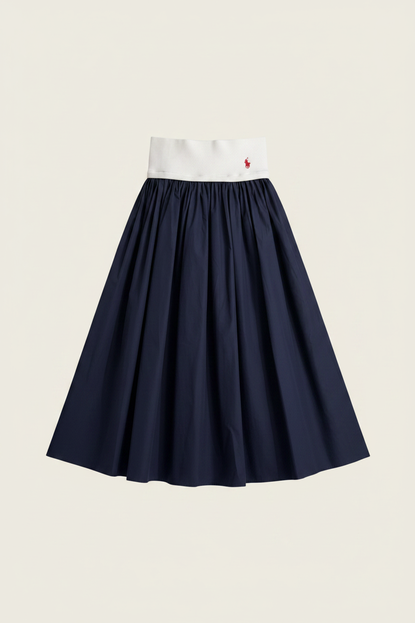 Polo Ralph Lauren Two-Tone Midi Skirt - white ribbed knit waistband with red polo pony logo and navy blue pleated skirt on off-white background