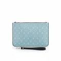 Blue pouch with monogram pattern on a white background