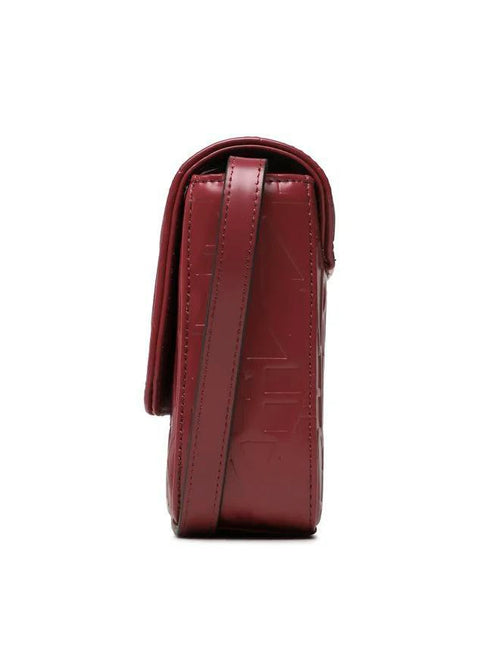 Maroon leather crossbody bag on a white background