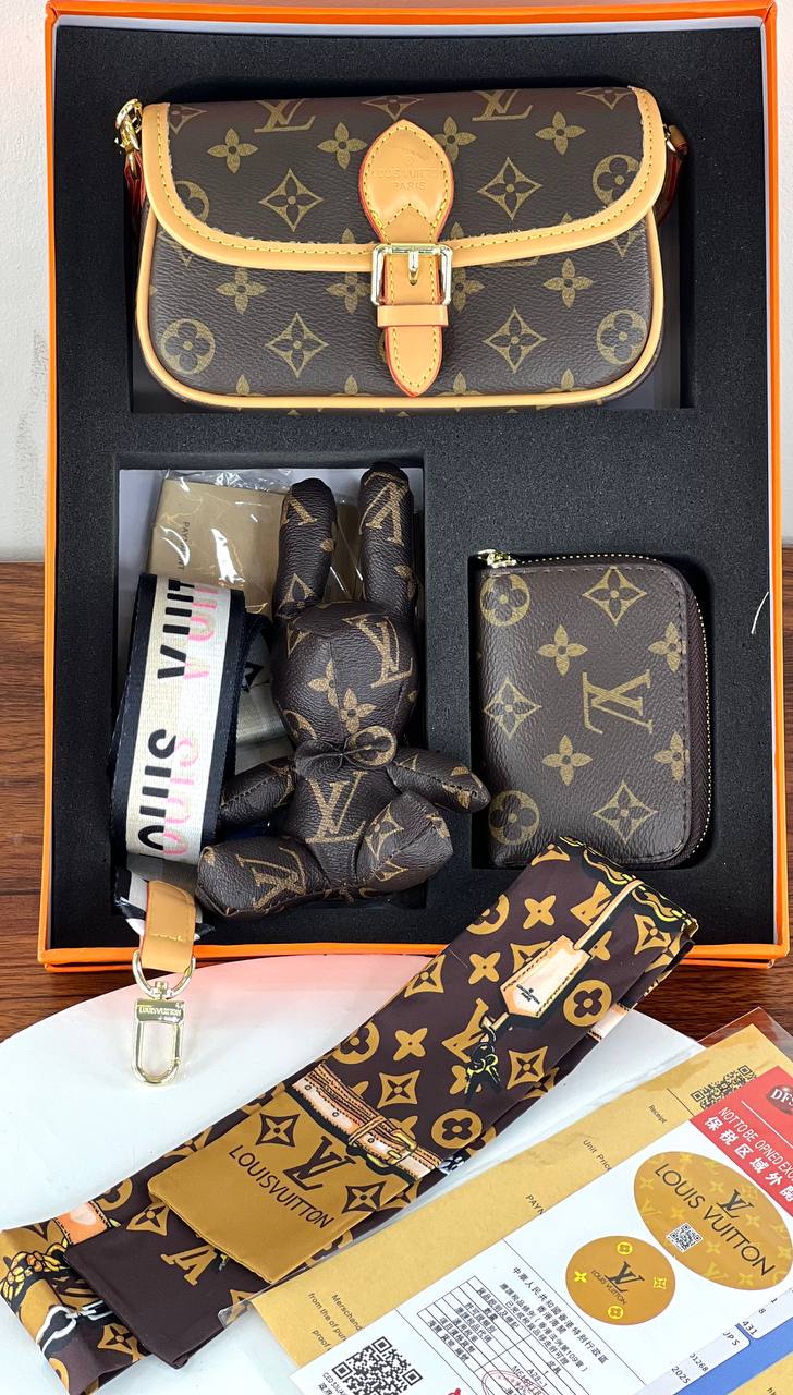Louis Vuitton monogram handbag set with accessories on a wooden surface.