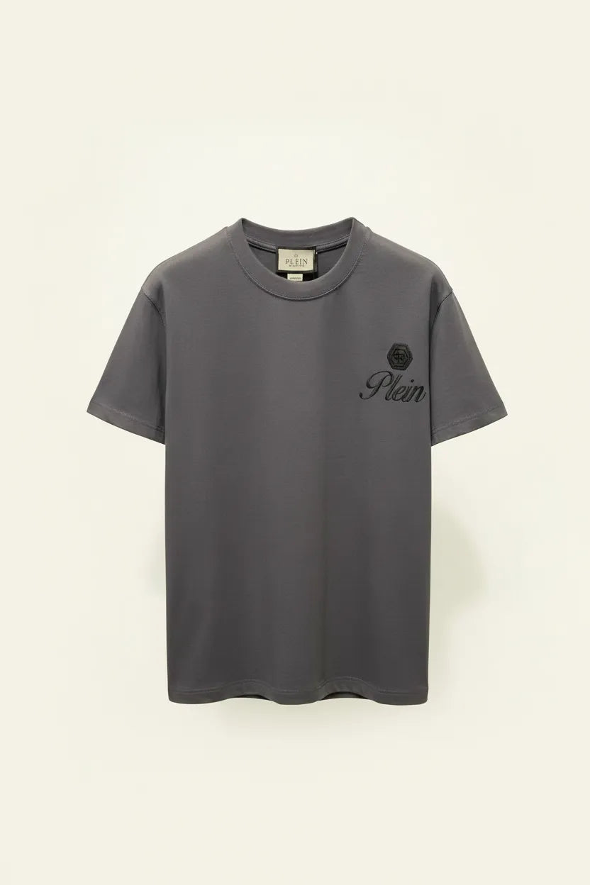 Gray t-shirt with a logo on a beige background