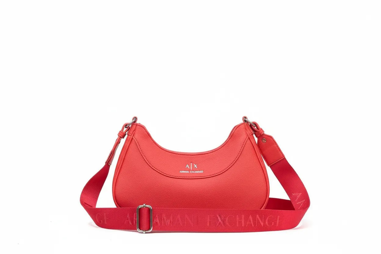 Red handbag with Armani Exchange logo on a white background