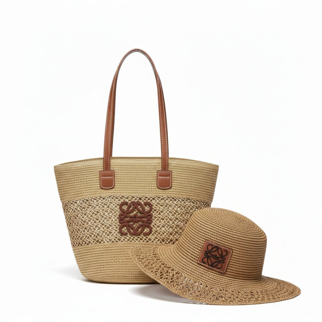 Beige straw tote bag and hat with a brand logo on a white background