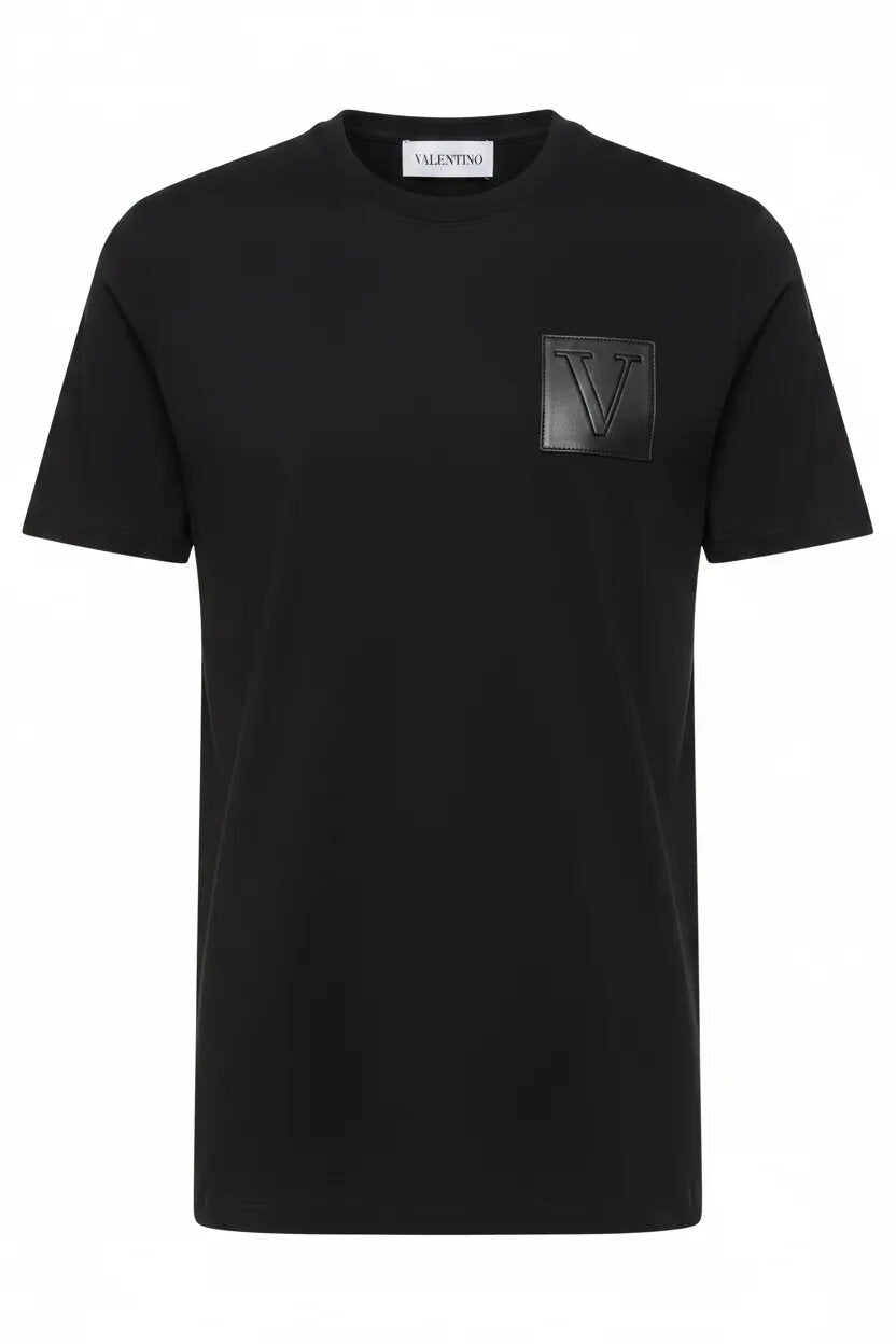 Black t-shirt with a logo on the chest against a white background